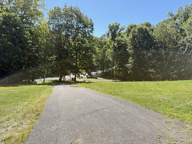 Set on a private 2-acre lot near Scoville Reservoir, this 4BR, 2 - photo 3