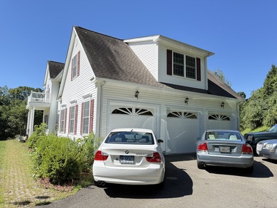 Set on a private 2-acre lot near Scoville Reservoir, this 4BR, 2 - photo 4
