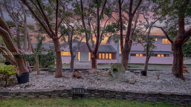 Situated on nearly an acre in the heart of prestigious Pinecrest - photo 1