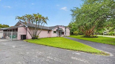 Situated on nearly an acre in the heart of prestigious Pinecrest - photo 2