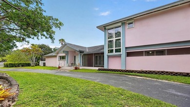 Situated on nearly an acre in the heart of prestigious Pinecrest - photo 3
