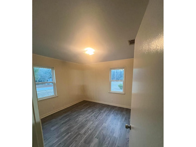 This beautifully renovated home boasts 3 spacious bedrooms and 1 - photo 12