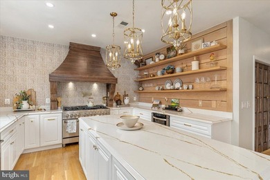 Indulge in the epitome of luxury living in this extraordinary - photo 9