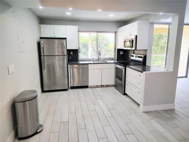 Lake Condo For Sale in Tamarac, Florida