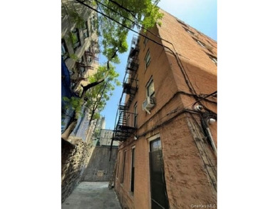 This commercial multi-use building features 19 residential and 2 - photo 5