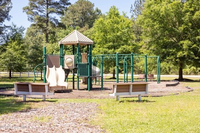Corner lot, just under one acre of land, located within the - photo 9