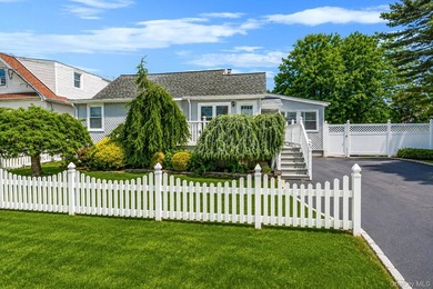 Welcome to this beautifully maintained expanded ranch in - photo 3