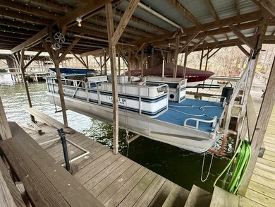 This Lake Bruin 100' lot has a 500 sf outdoor kitchen with roll - photo 13