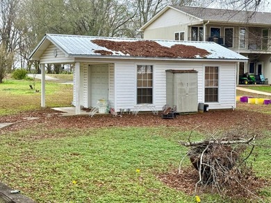This Lake Bruin 100' lot has a 500 sf outdoor kitchen with roll - photo 16