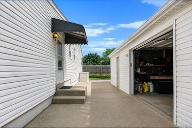 Welcome to this beautifully maintained expanded ranch in - photo 8