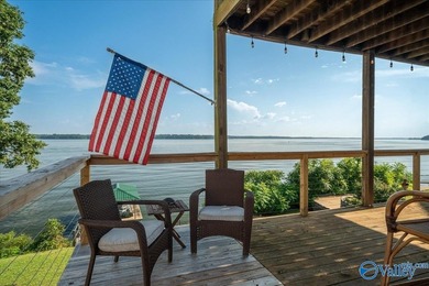 Experience turnkey waterfront living in Bay Village on the - photo 1