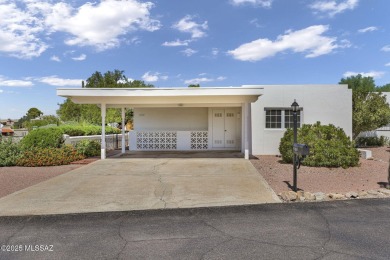 Welcome to this beautifully maintained 3-bedroom end unit in the