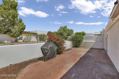 Welcome to this beautifully maintained 3-bedroom end unit in the