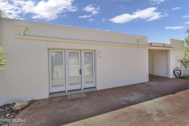 Welcome to this beautifully maintained 3-bedroom end unit in the