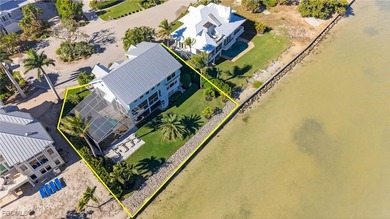 This exceptional fully furnished waterfront residence offers a