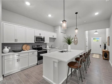 Tile throughout. Quartz countertops. Impact windows. Paver - photo 3