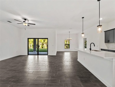 Tile throughout. Quartz countertops. Impact windows. Paver - photo 7