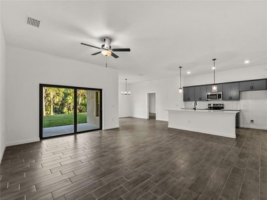 Tile throughout. Quartz countertops. Impact windows. Paver - photo 8
