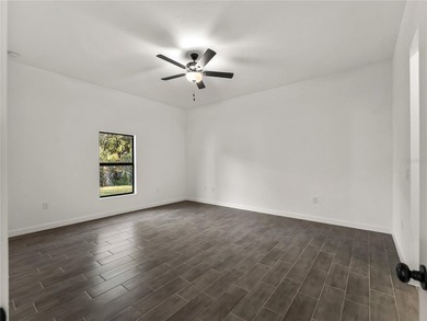 Tile throughout. Quartz countertops. Impact windows. Paver - photo 10