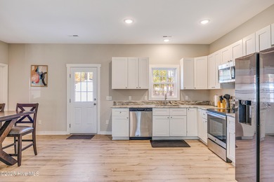 Discover comfort and convenience in this well-maintained - photo 11