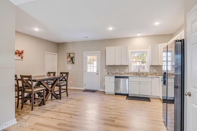 Discover comfort and convenience in this well-maintained - photo 12