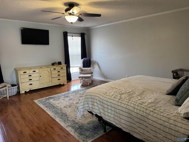 Welcome to this stunning 4 bedroom, 2.5 bathroom full brick home