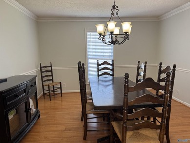 Welcome to this stunning 4 bedroom, 2.5 bathroom full brick home