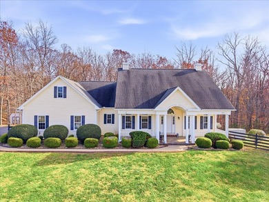 Gleaming hardwoods welcome you into this stunning one-level