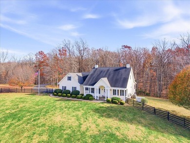 Gleaming hardwoods welcome you into this stunning one-level