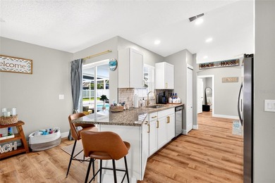Welcome to this beautifully renovated 4-bedroom, 2-bathroom home - photo 8