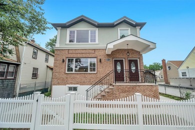 Introducing a stunning 2026-built legal two-family home situated - photo 1