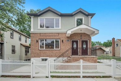 Introducing a stunning 2026-built legal two-family home situated - photo 3