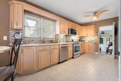 1866 Greenleaf Blvd is a timeless brick home offering space - photo 8