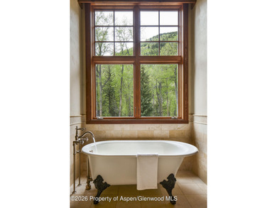 Set along the banks of picturesque Castle Creek, this remarkable - photo 12