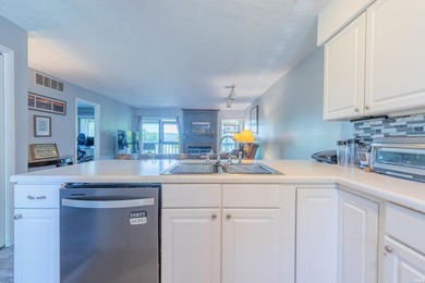 Enjoy this easily accessible first-floor Water's Edge 2-bedroom - photo 9