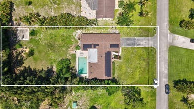 Welcome to this exceptional single-family home in the highly - photo 2
