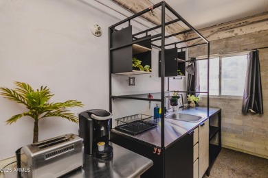 Welcome to the ONLY STUDIO in Windsor Place! This condo building