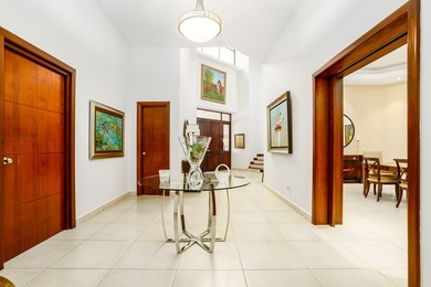 Located in the exclusive community of Costa del Este, within - photo 9
