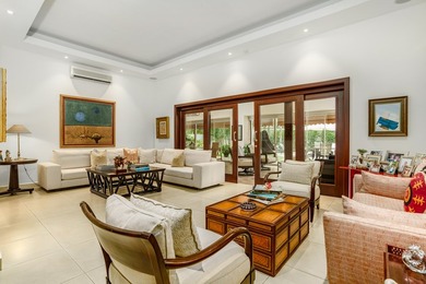 Located in the exclusive community of Costa del Este, within - photo 10
