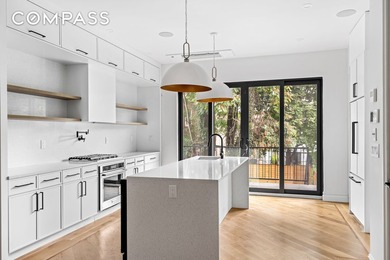 Welcome to 608 Van Buren Street, where modern luxury meets urban - photo 6