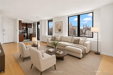 Perched on a high floor with breathtaking skyline views, this - photo 2