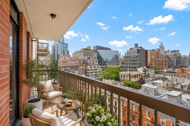 Perched on a high floor with breathtaking skyline views, this - photo 6