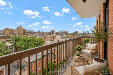 Perched on a high floor with breathtaking skyline views, this - photo 7