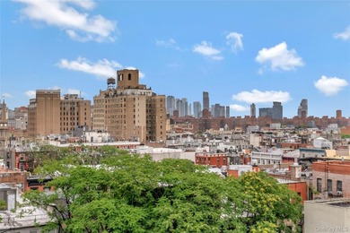 Perched on a high floor with breathtaking skyline views, this - photo 8
