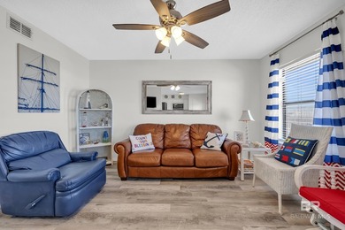 Beachside living made easy! This updated 2BR/1BA condo sits - photo 12