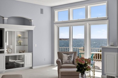 Set on 2.5 acres within the coveted Wings Neck community, this - photo 12