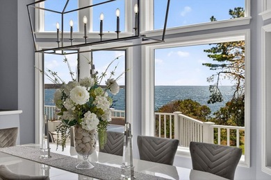 Set on 2.5 acres within the coveted Wings Neck community, this - photo 15