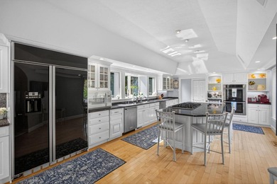 Set on 2.5 acres within the coveted Wings Neck community, this - photo 16