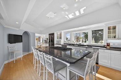 Set on 2.5 acres within the coveted Wings Neck community, this - photo 17