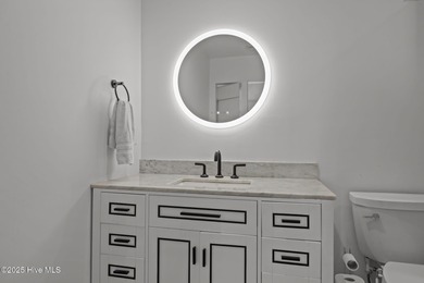 Experience coastal elegance in this beautifully upgraded